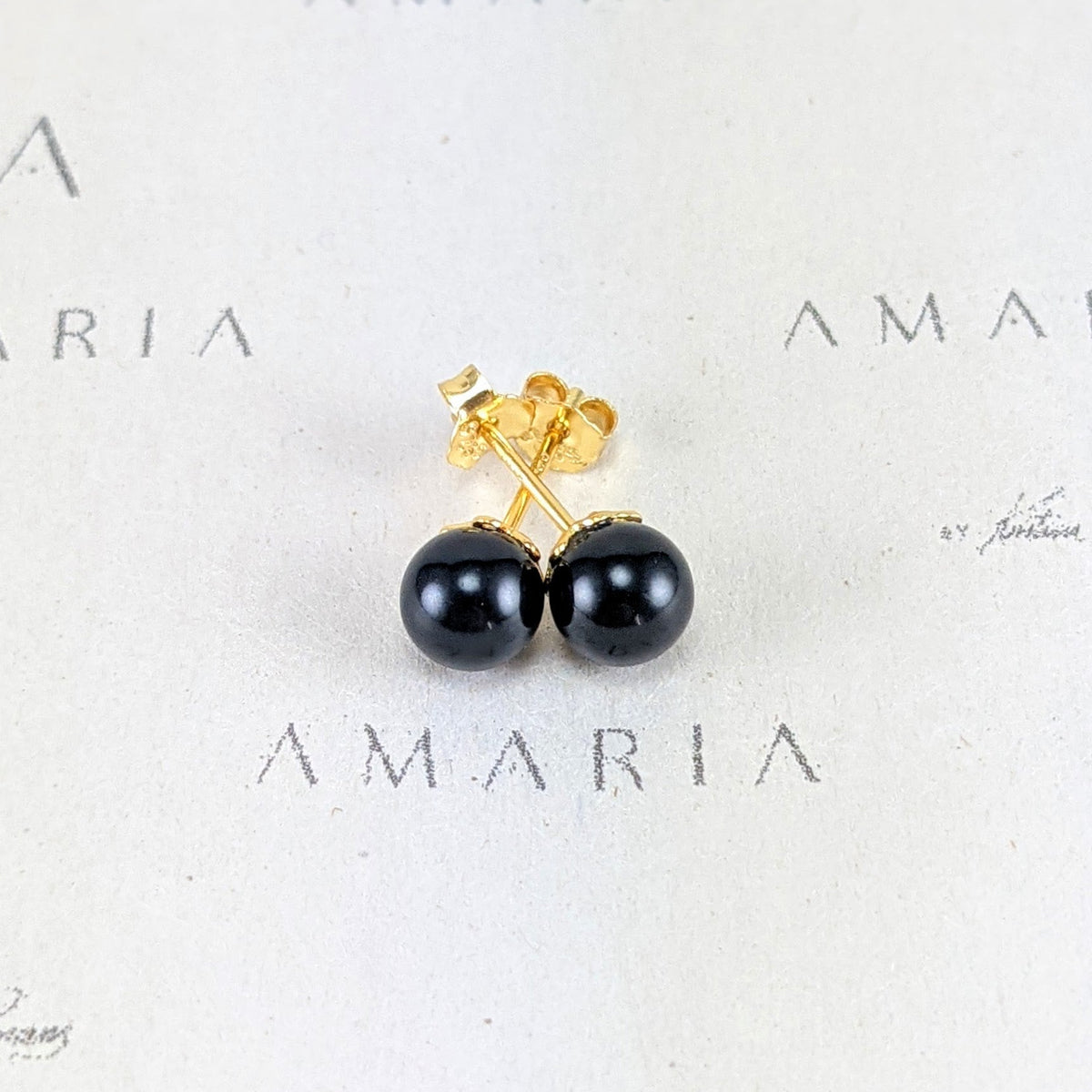 Mystic black crystal pearl studs
