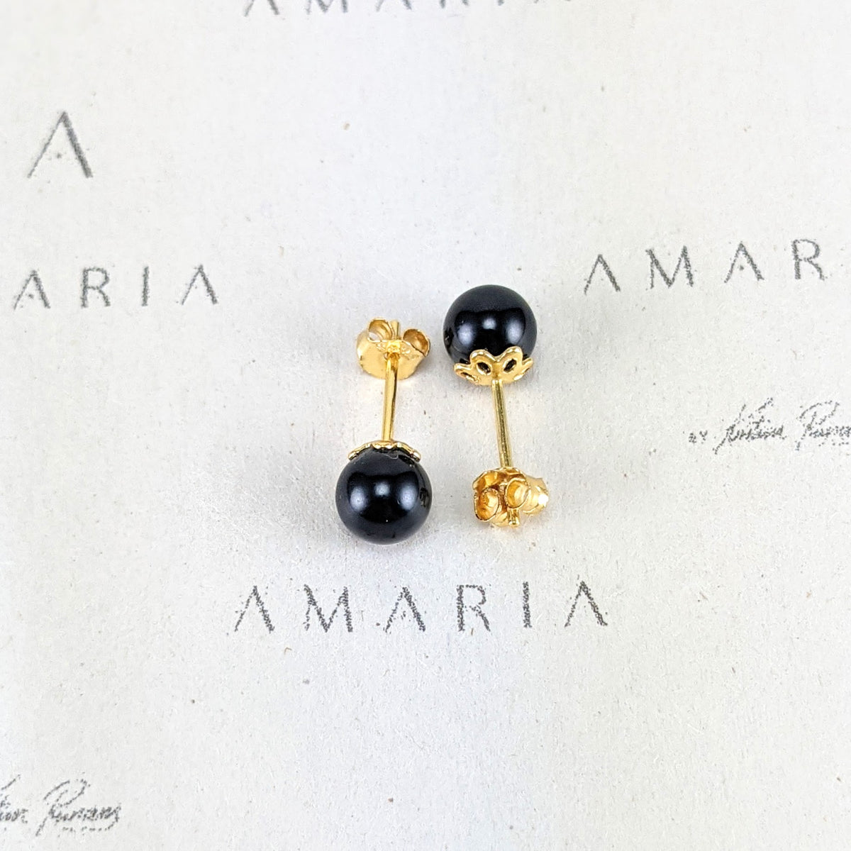 Mystic black crystal pearl studs