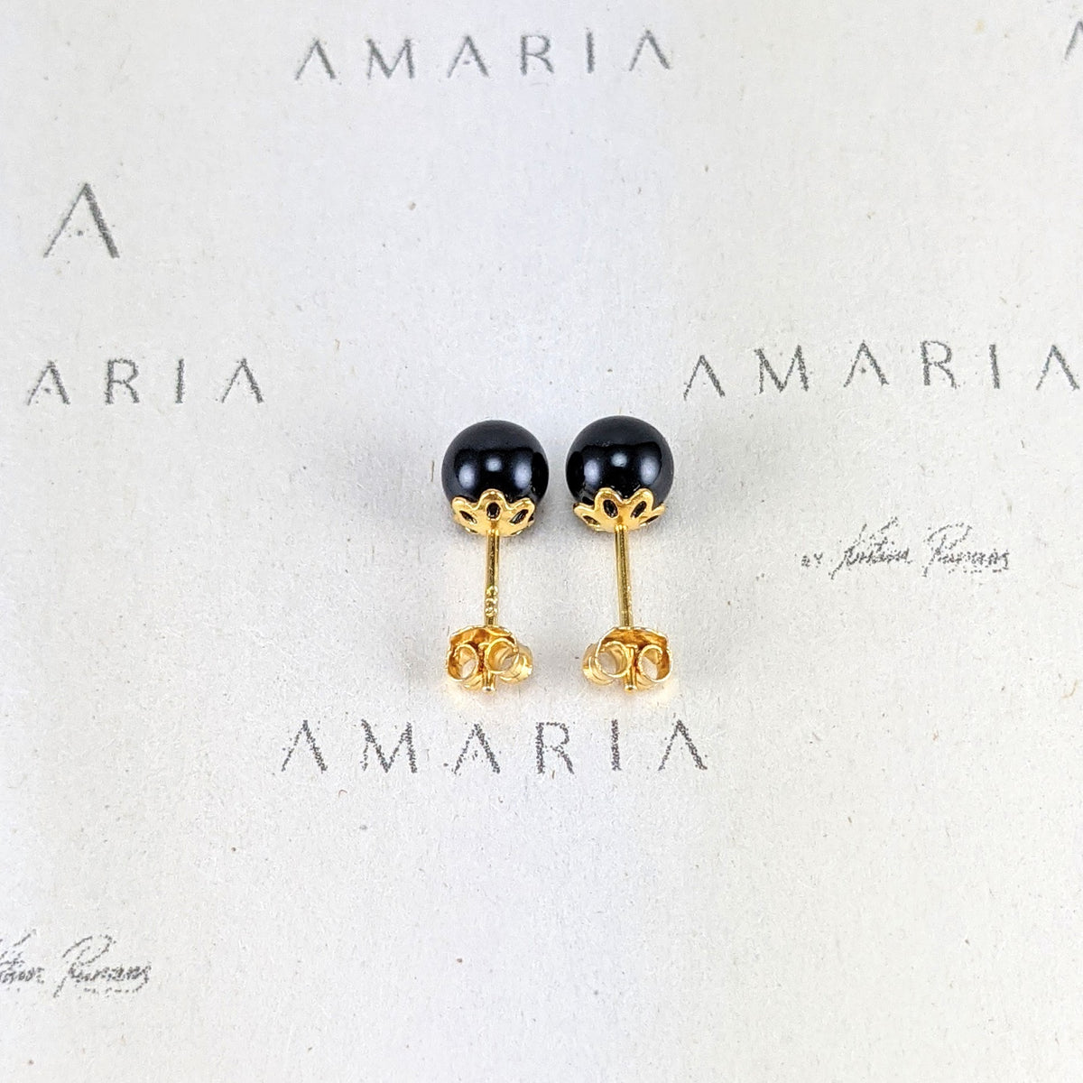 Mystic black crystal pearl studs