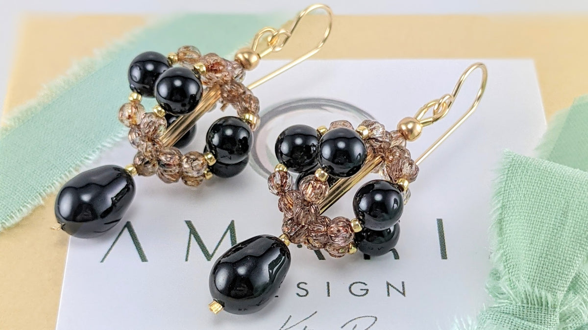 Mystic black crystal pear earrings
