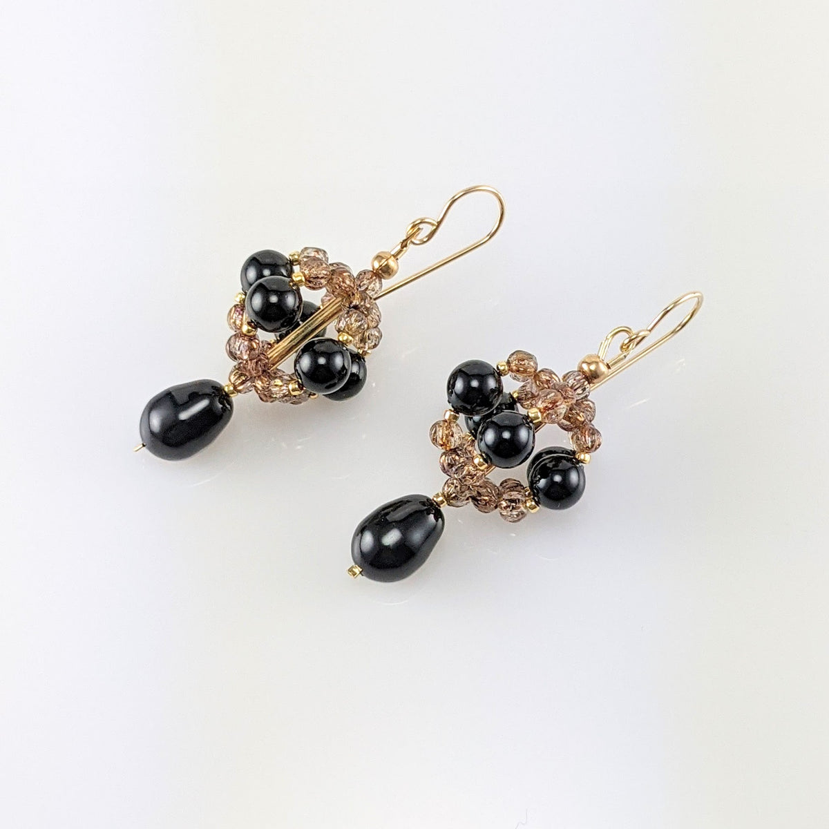 Mystic black crystal pear earrings