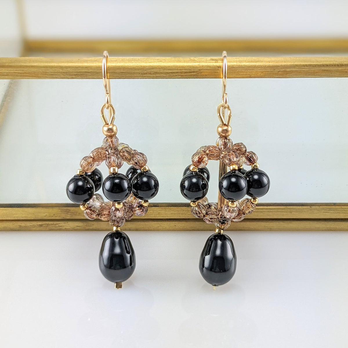 Mystic black crystal pear earrings