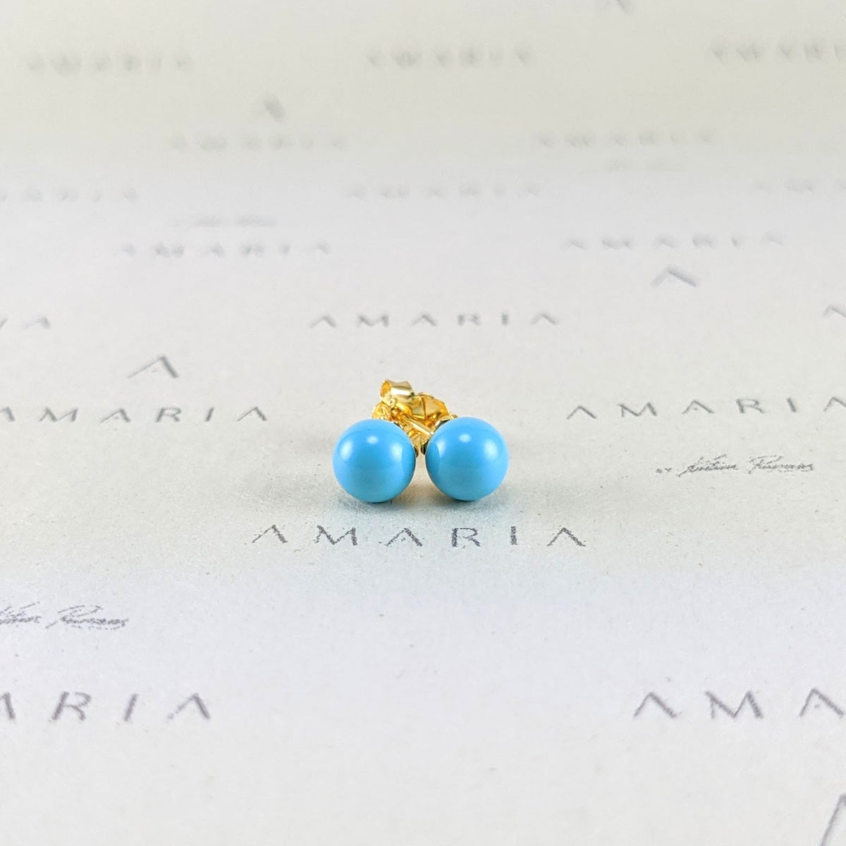 Turquoise blue crystal pearl studs