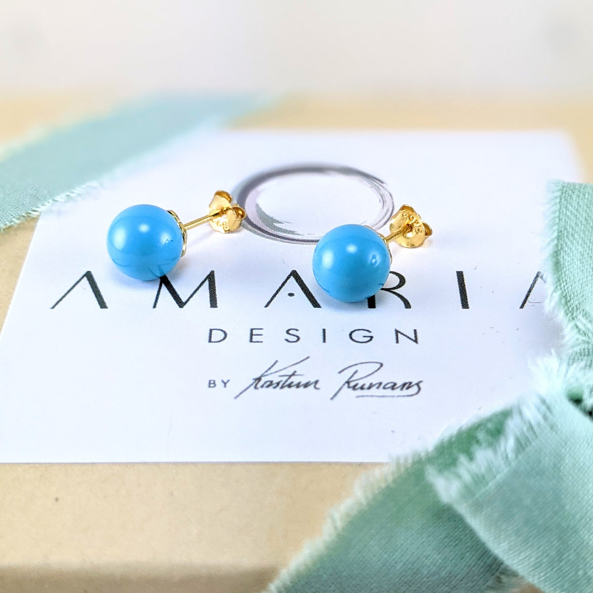 Turquoise blue crystal pearl studs