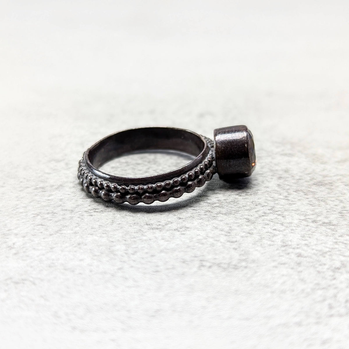 Umber cubic zirconia silver ring