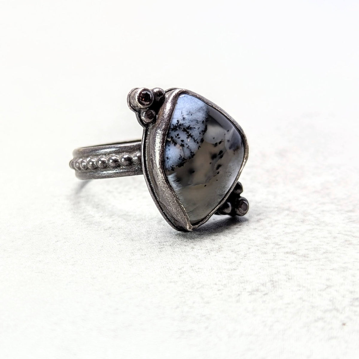 Dendritic agate silver ring with umber accent
