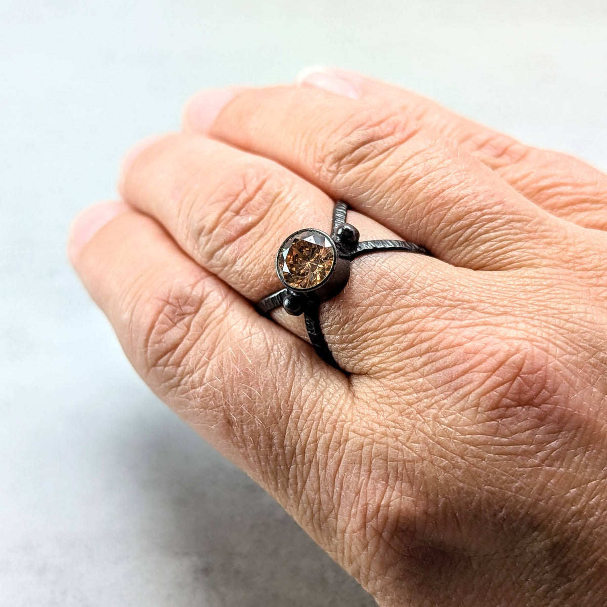 Golden cubic zirconia silver ring