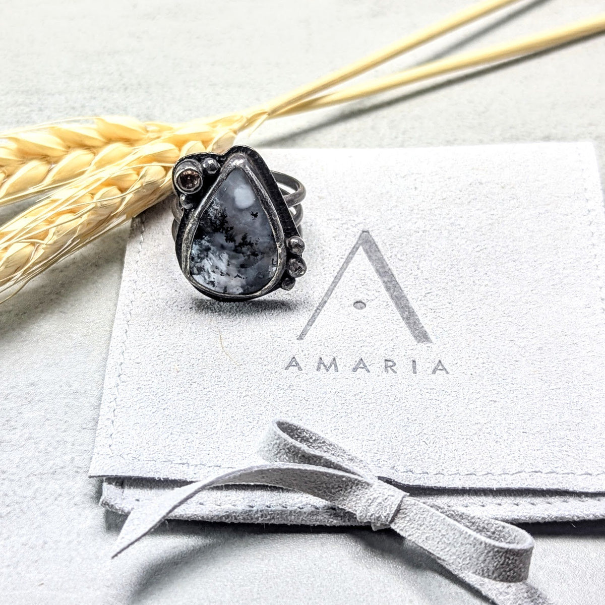 Dendritic agate silver ring with golden accent