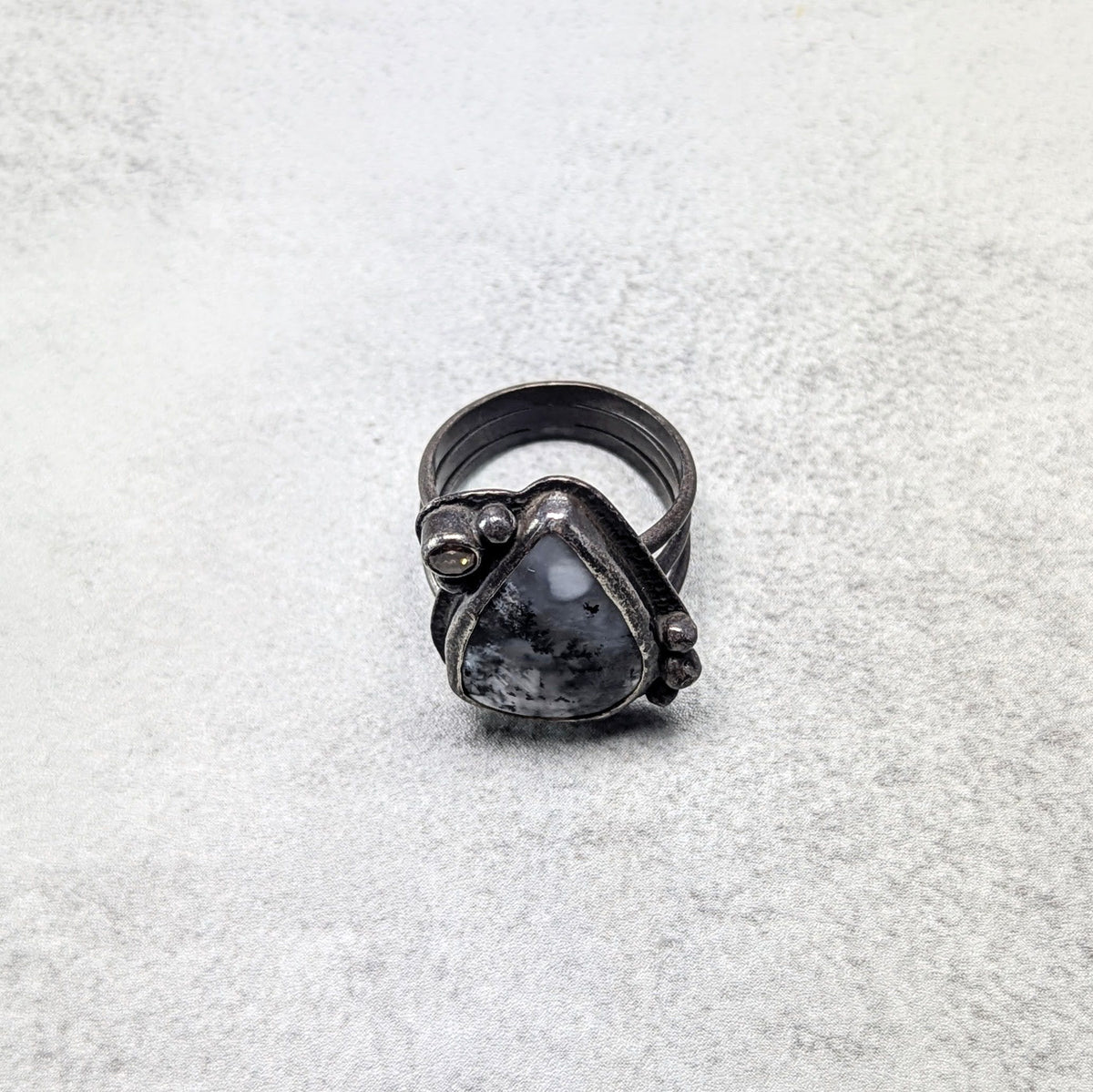 Dendritic agate silver ring with golden accent