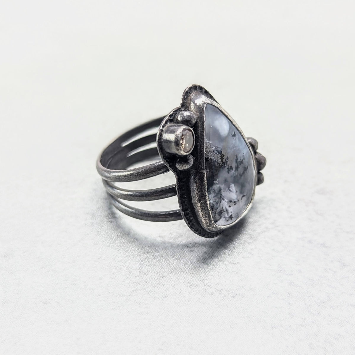 Dendritic agate silver ring with golden accent