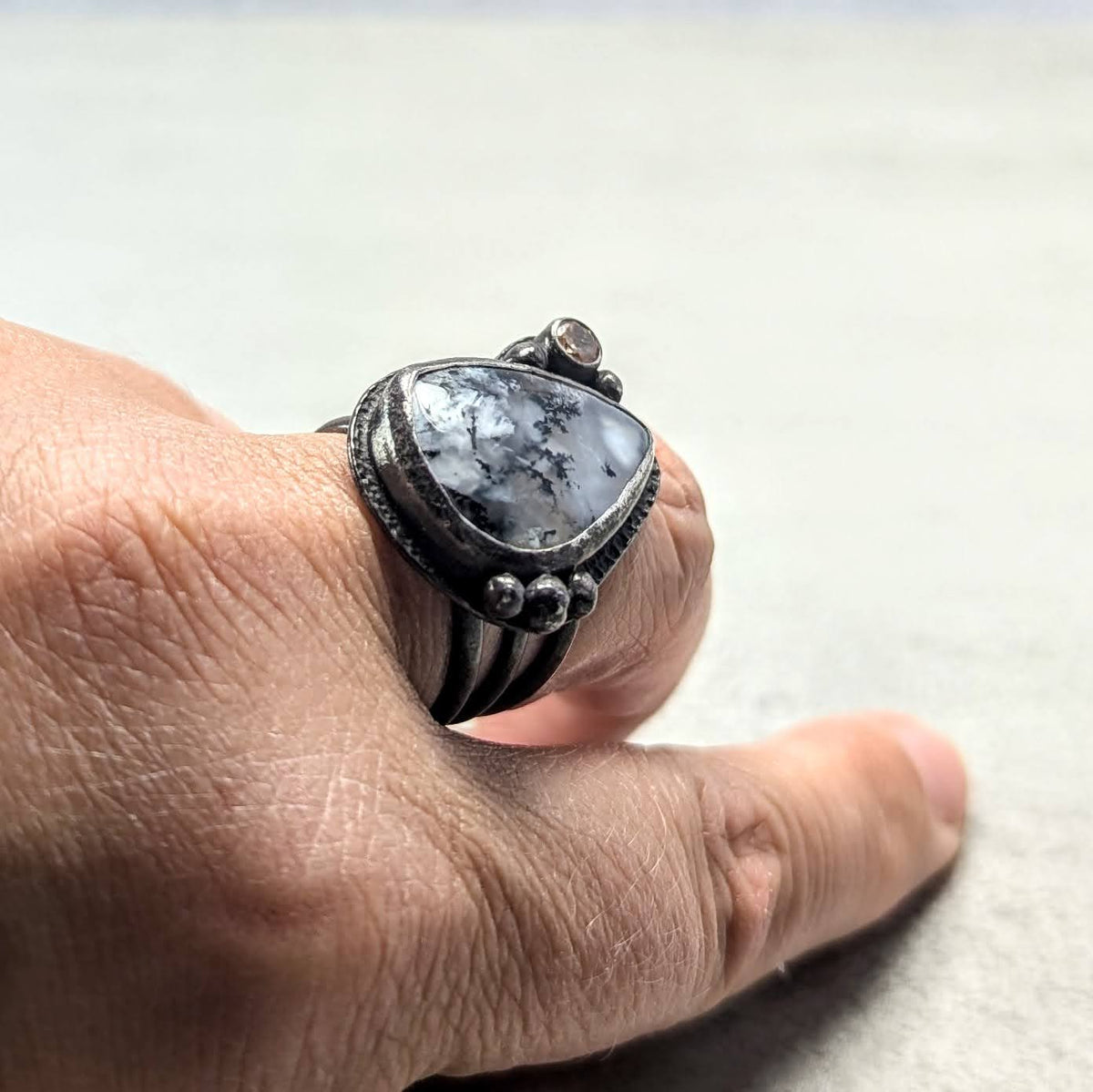 Dendritic agate silver ring with golden accent